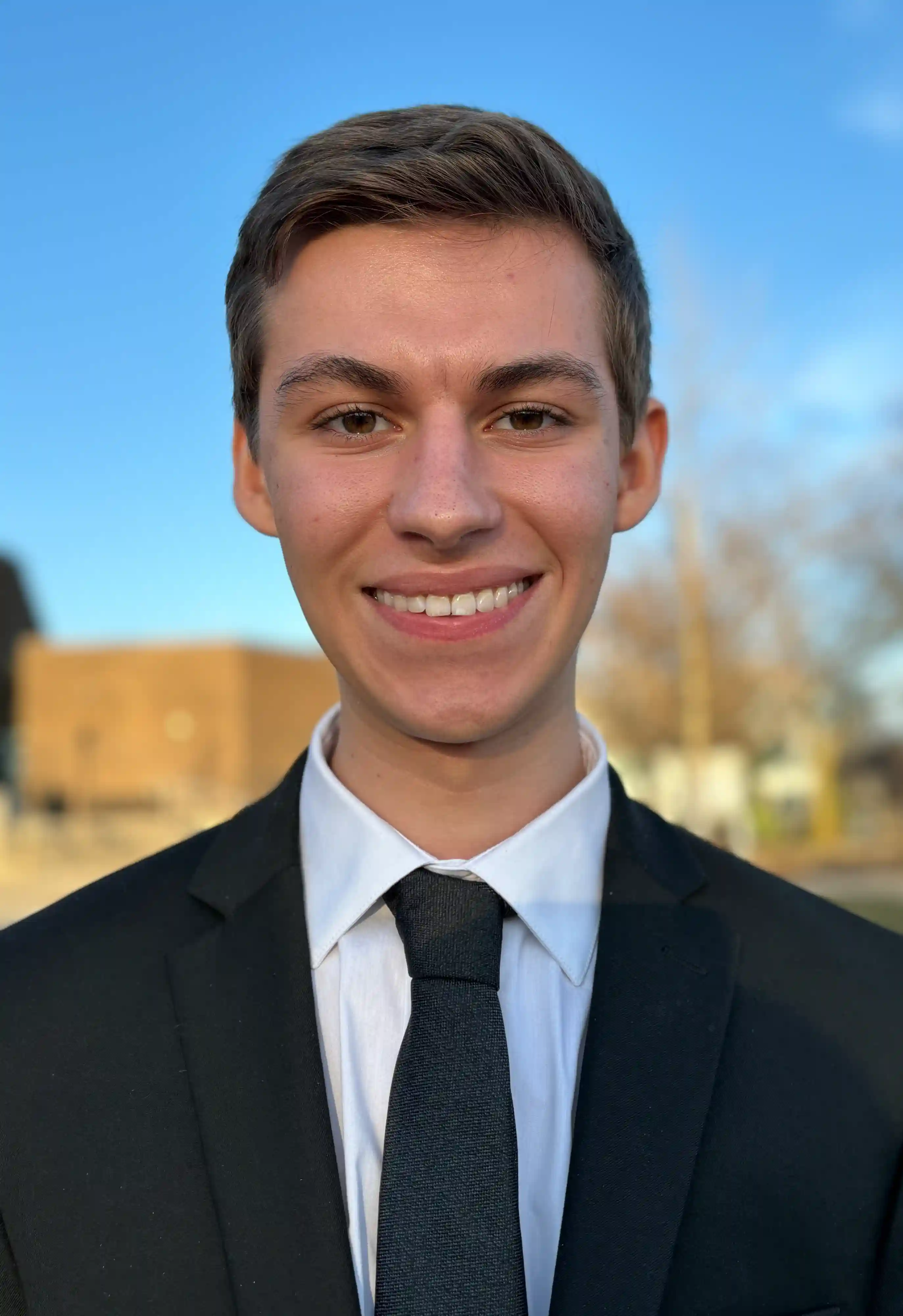 Professional headshot of Marcos Sanson