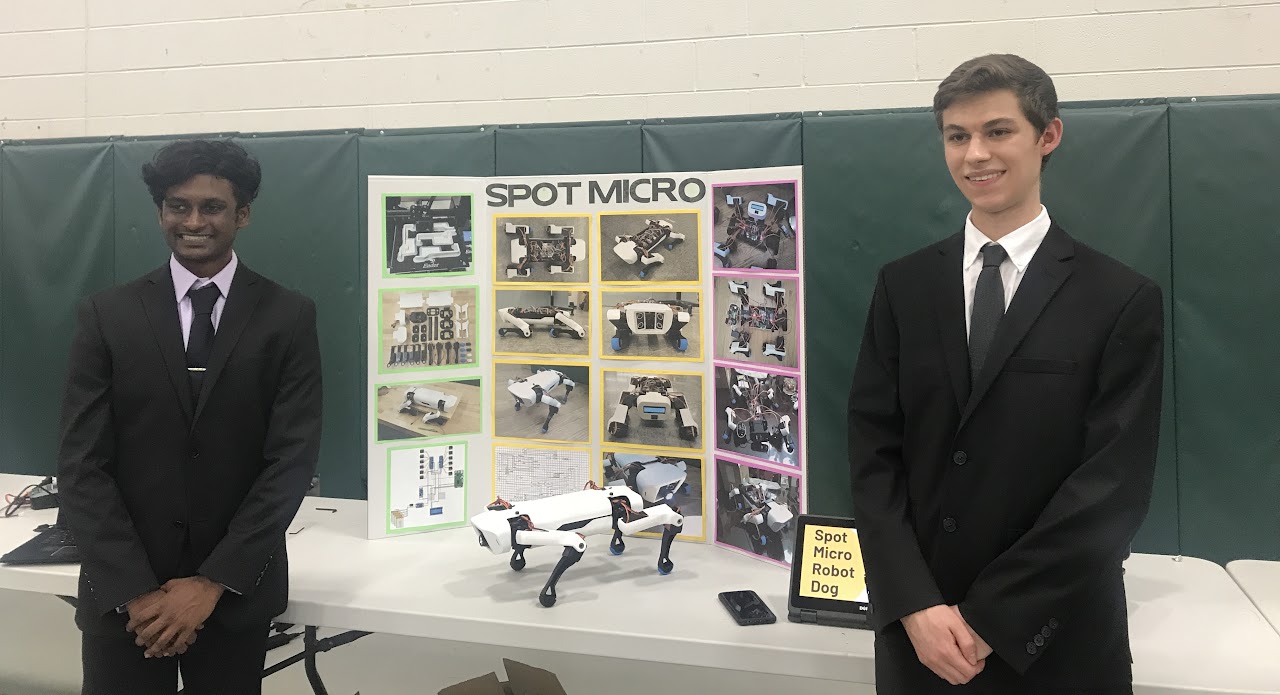 Marcos Sanson and Ronit Nagarapu with Spot Micro Robot